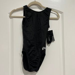 New with tags. Adult Small. Official GK black gymnastics leotard & scrunchie